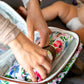 Bolso con mudador infantil sustentable flores